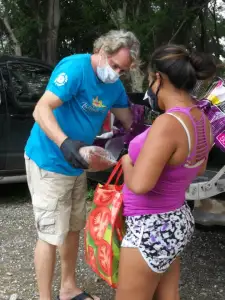 Michael Simons helping the needy